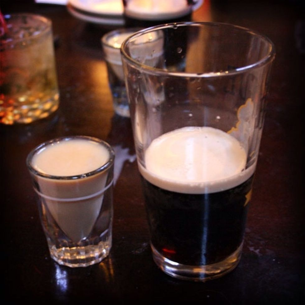 Add the Bailey's and Jameson to a shot glass, layering the Bailey's on the bottom. Pour the Guinness into a pint glass or beer mug 3/4 of the way full and let settle.