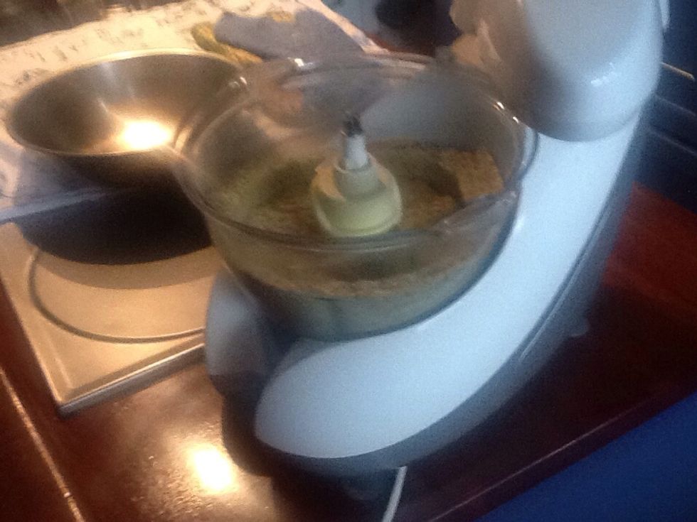 Add the baking powder and ground almonds and pulse till just combined.