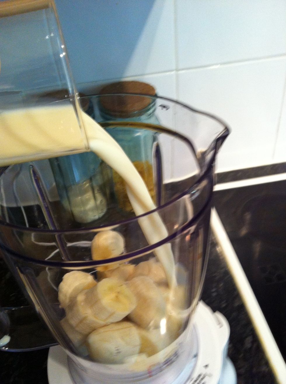Add the banana and soya to the blender. (you can use semi skimmed milk instead).