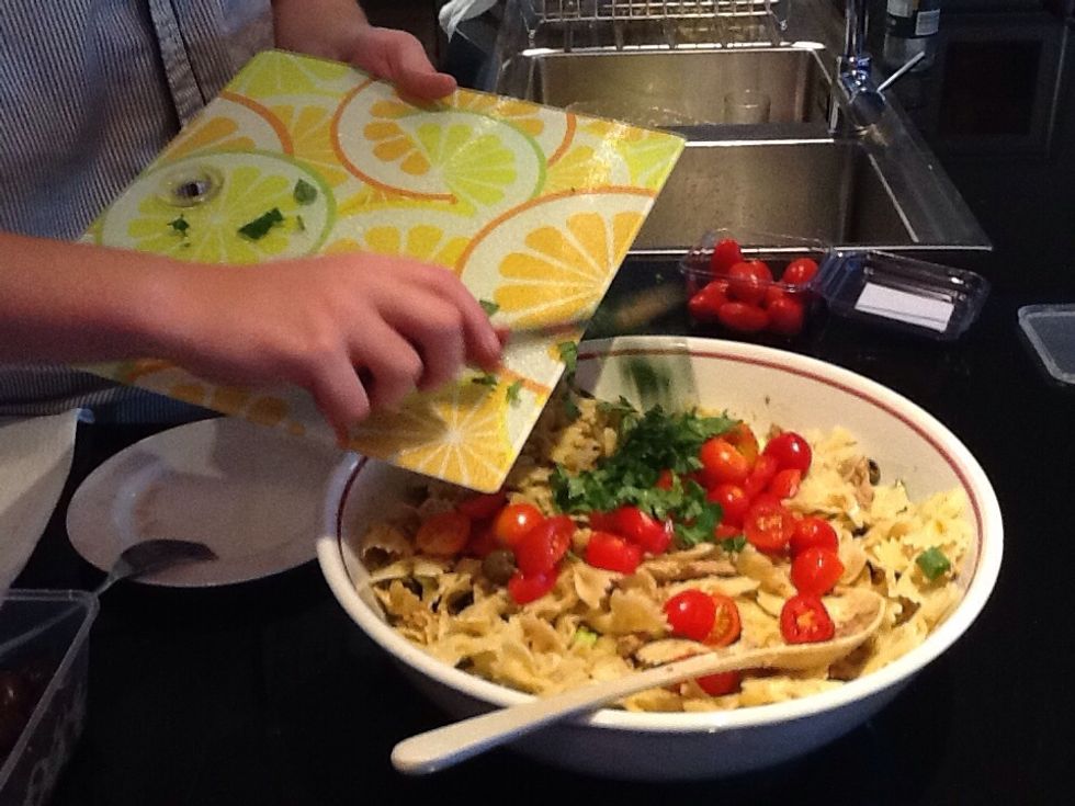 Add the basil leaves into the bowl
