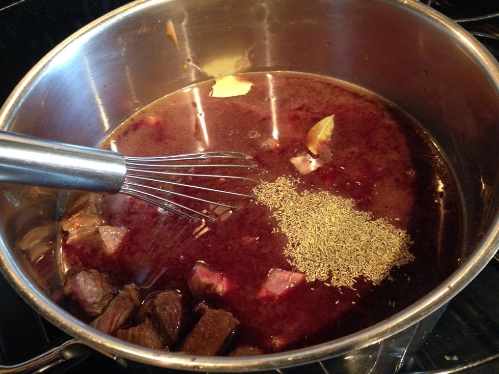 Add the bay leaves, thyme, rosemary, coriander and pepper.