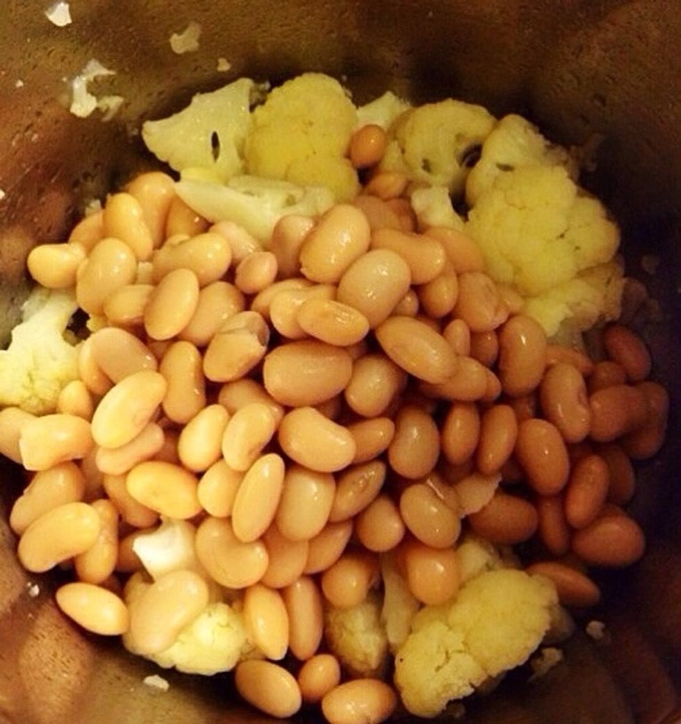 Add the beans to the pan with the cauliflower.