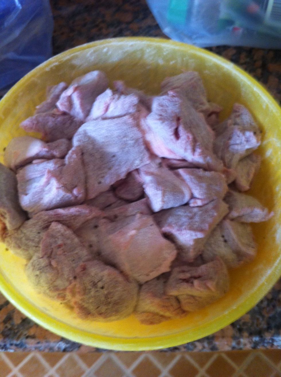 Add the beef and cover it all with the seasoned flour and make sure it's all covered and add more flour as needed, leave it aside