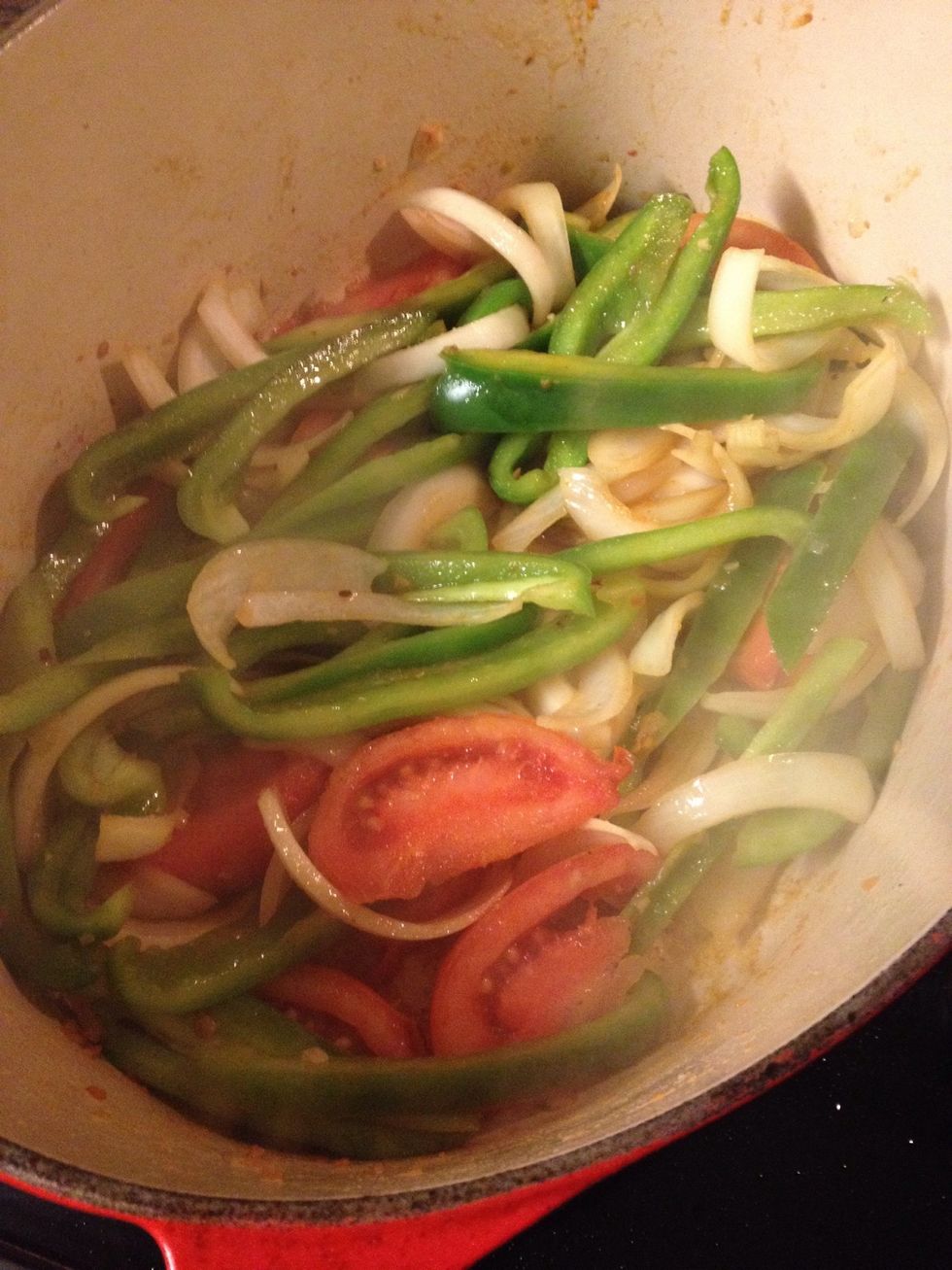 Add the beef broth and tomato paste