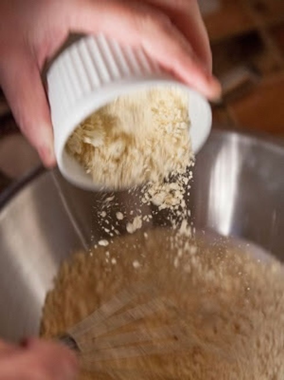 Add the besan flour into the coconut milk and mix it into a smooth batter.