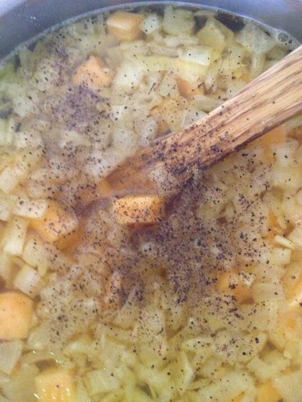 Add the black pepper and stir well,reduce heat and allow to remain at a constant simmer until sweet potatoes are tender
