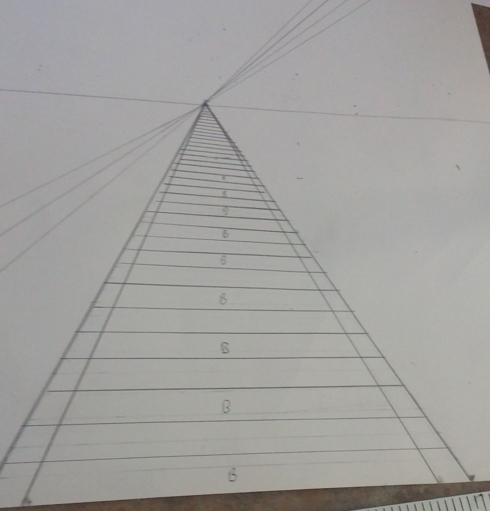 Add the boards and spaces with lines going straight across. Remember boards closest to bottom are bigger and gradually get thinner farther back. Label every other with a B to show the board vs space.