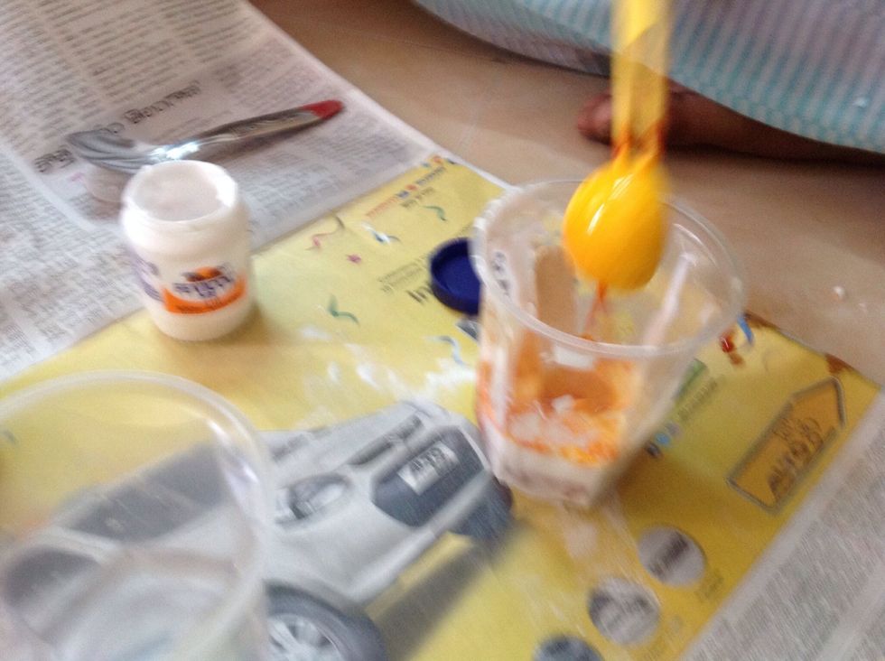 Add the borax or washing soda solution.Add some food colour to it,I chose red color