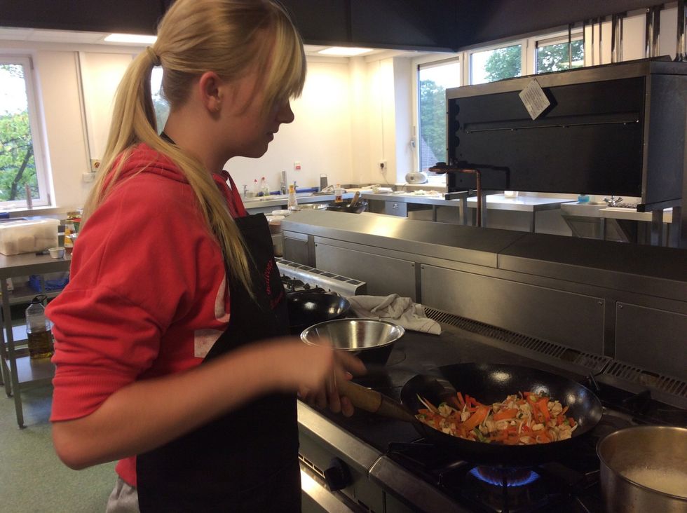 Add the bowl of veg, constantly stirring