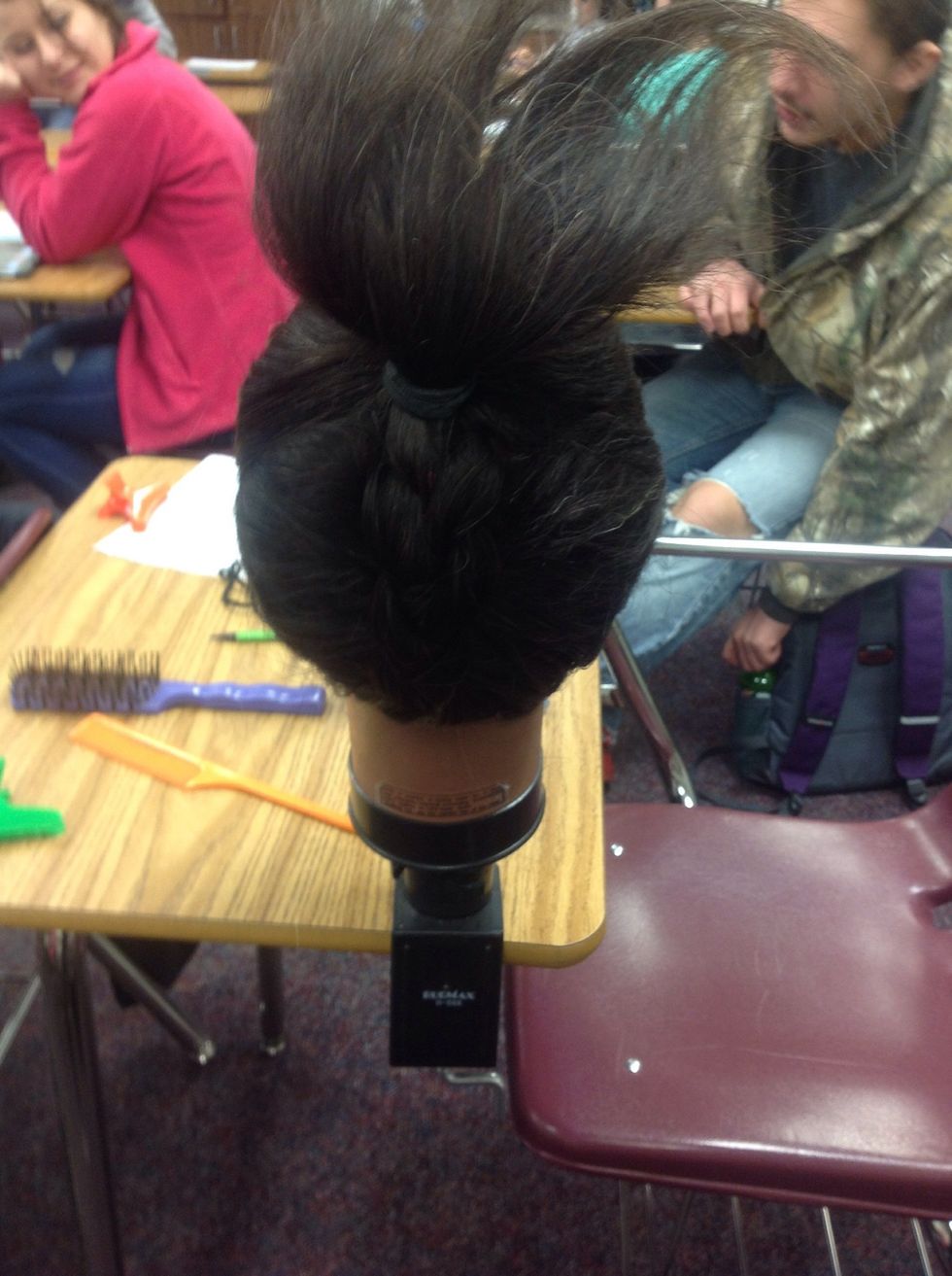 Add the braid into the ponytail