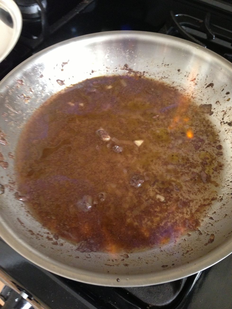 Add the brandy and tilt the pan over to light it. Or use a match if you're impoverished by an electric range.