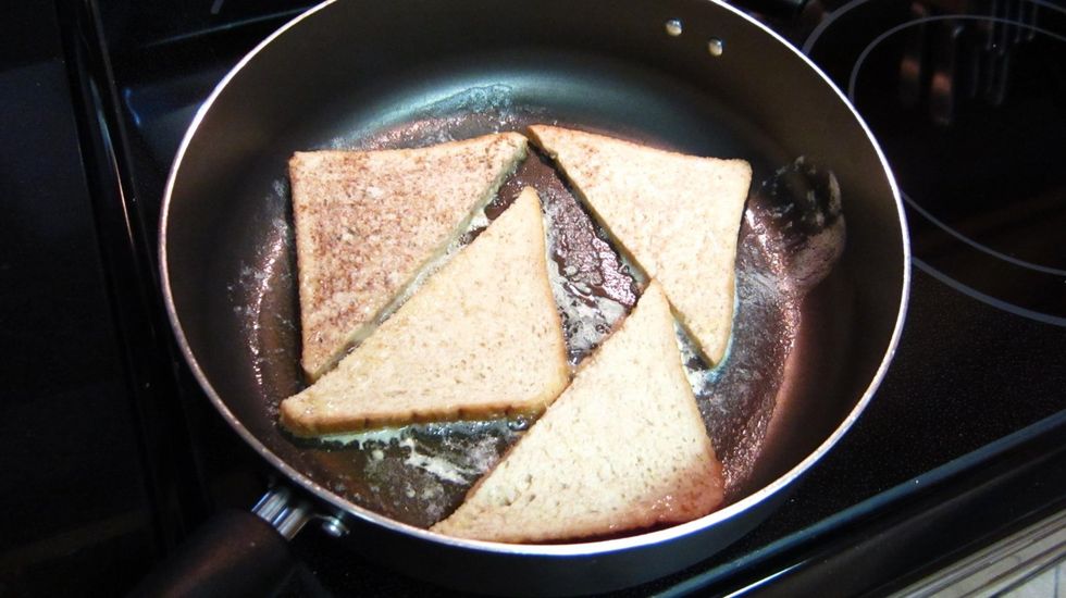 Add the bread and fry both sides until golden brown. About 2 minutes per side. Well maybe a little longer depending your pan and stove.