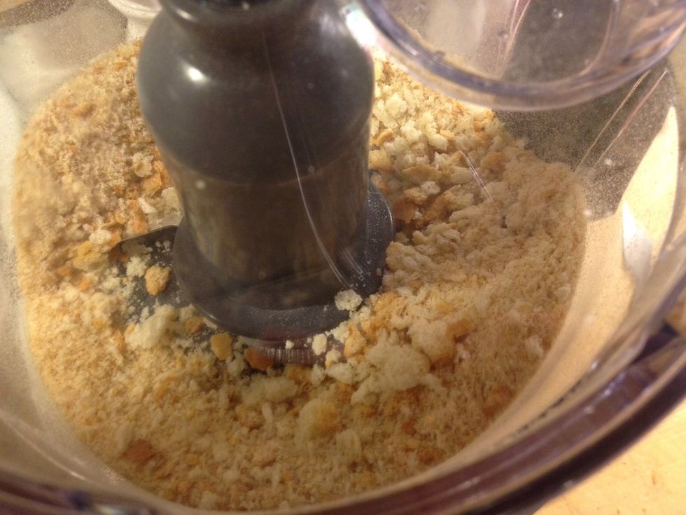 Add the breat into mixer and make bread grumbs.