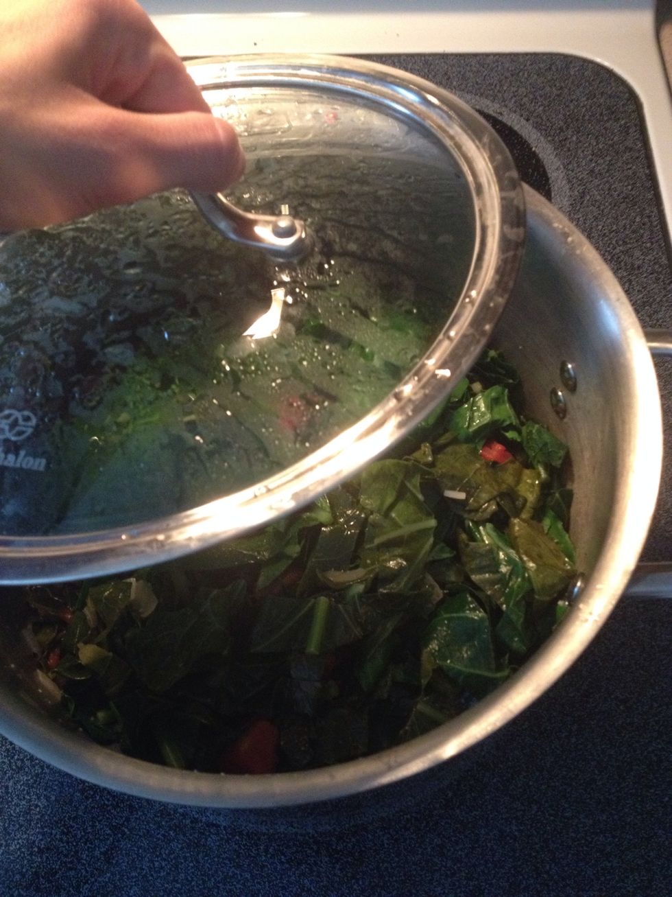 Add the broth and greens. Cover with a lid. Bring to a simmer and let cook at least 1 hour. They should be soft all the way through the leaf and stems in the center.