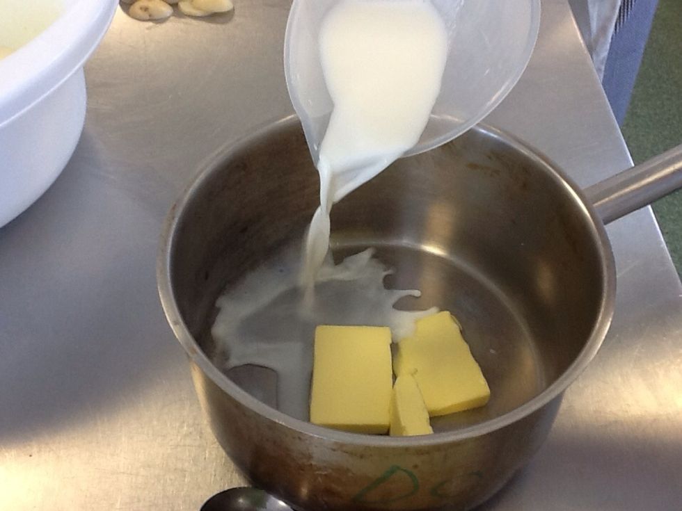 Add the butter and milk into a frying pan and melt it all