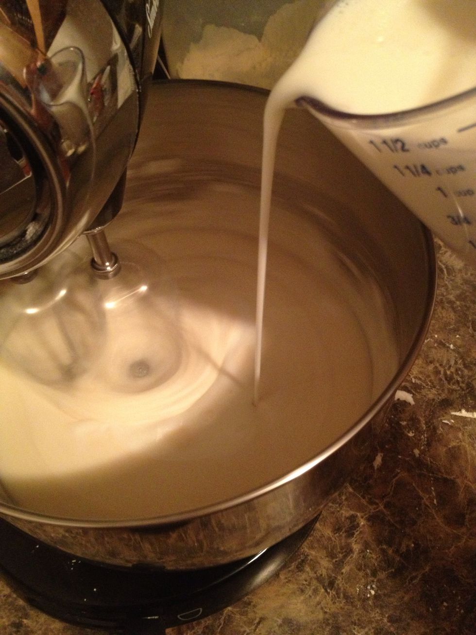 Add the butter milk and cake mixture in 3 parts, alternating between the two. By sure to lower the speed of your mixer unless you like the batter in your face! Lol.