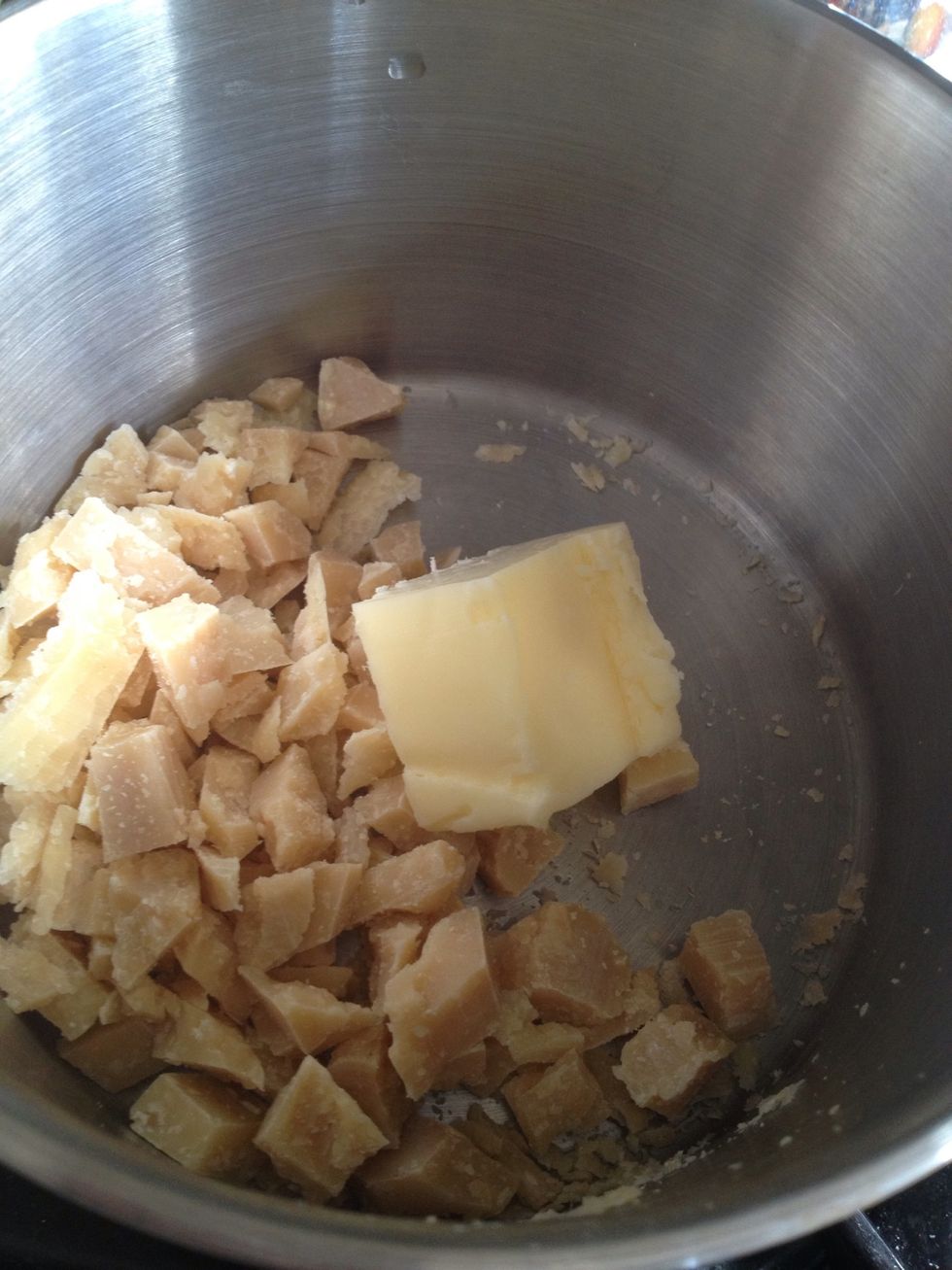 Add the butter to the cheese in the pan. Make sure you keep stirring when it starts to melt to ensure the sauce is nice and smooth.