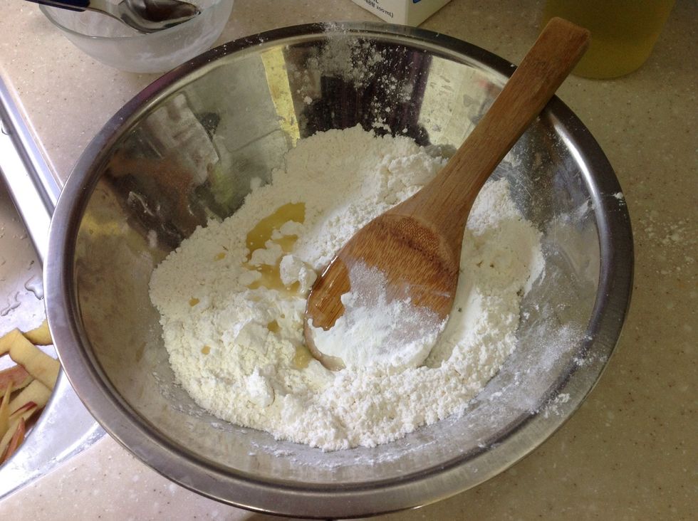 Add the butter to the flour. I personally substituted some of the butter to canola oil.