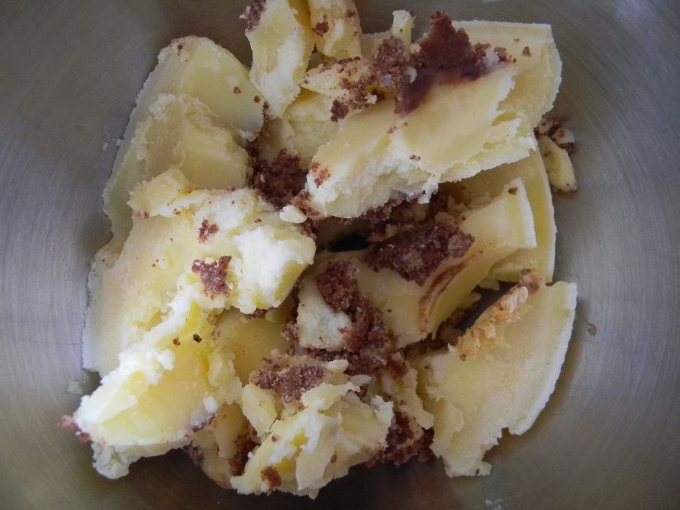 Add the butter to the mixing bowl.