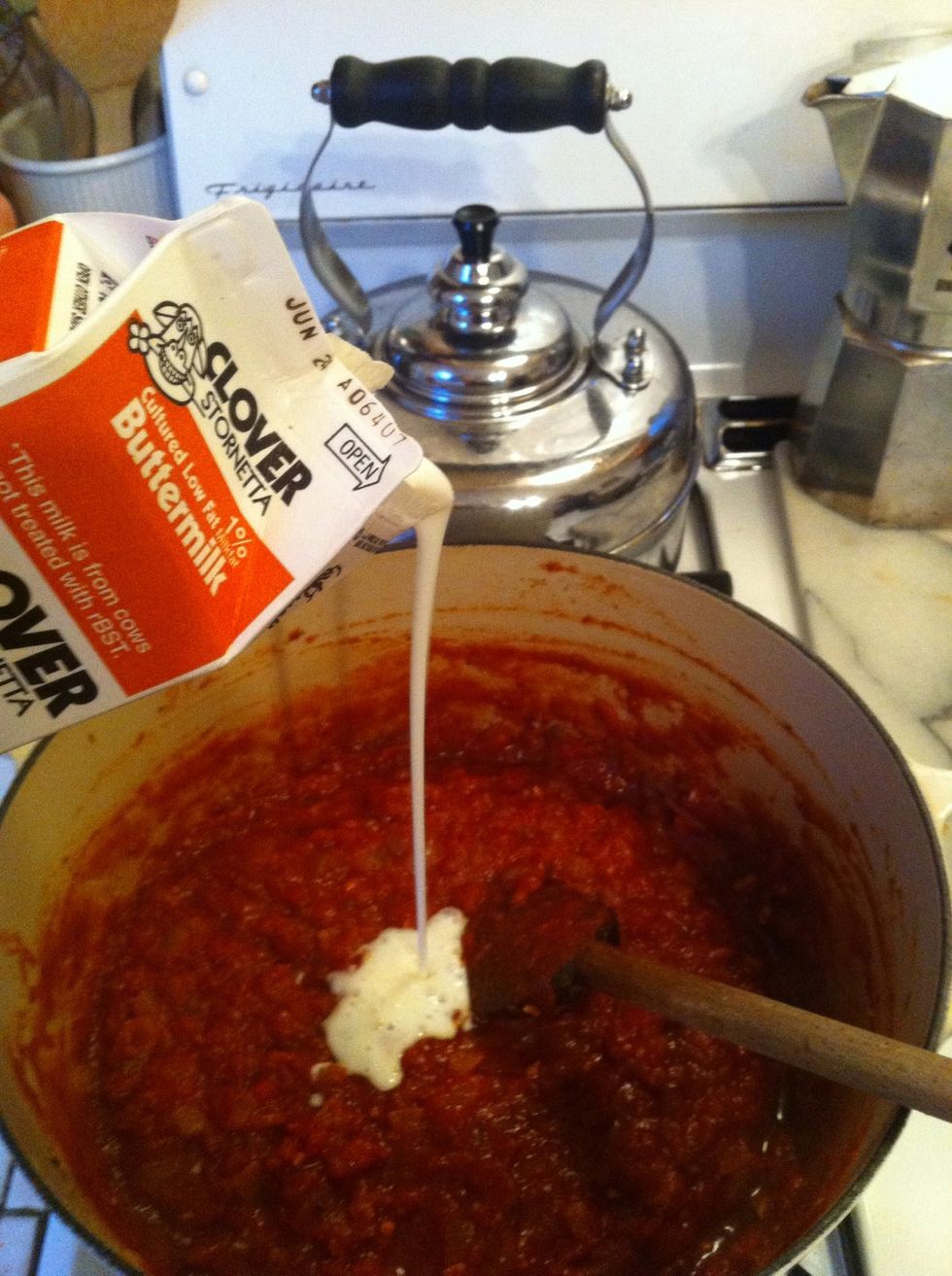 add the buttermilk into your masala sauce. it's what gives it that orange color.