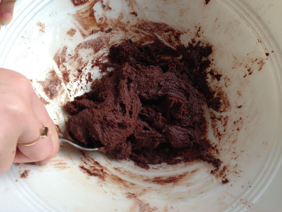 Add the cacao and the flour to the other bowl and mix