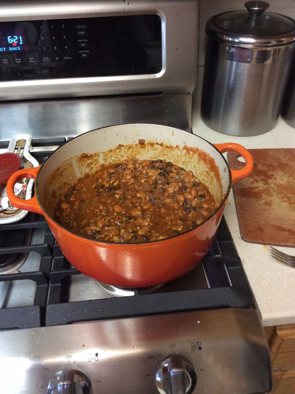 Add the can of tomato sauce. Stir to incorporate. The chili should be fairly liquid at this point. If it seems on the thicker side add chicken stock or more beer.
