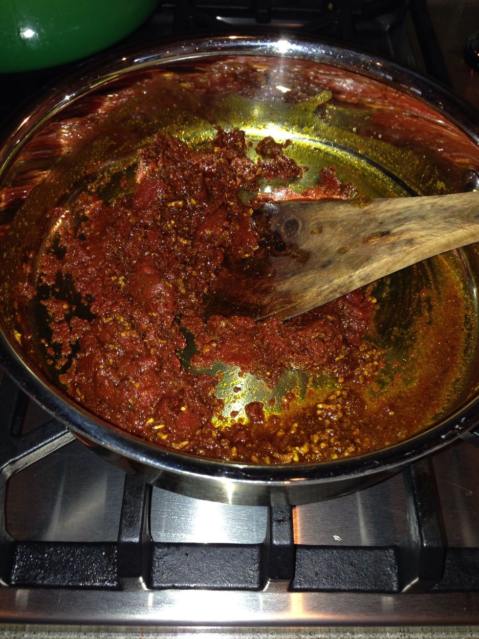 Add the can of tomatoes paste and stir for 4 minutes while on medium heat.