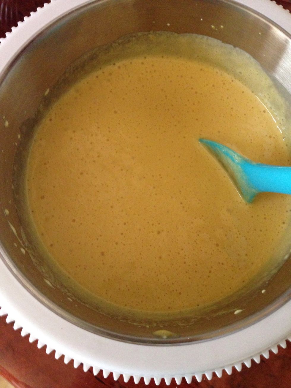 Add the canned caramel, sour cream, soda mixed with vinegar and mox well