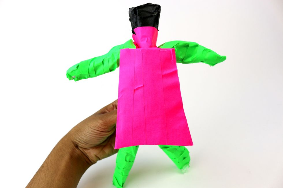 Add the cape onto your figurine!