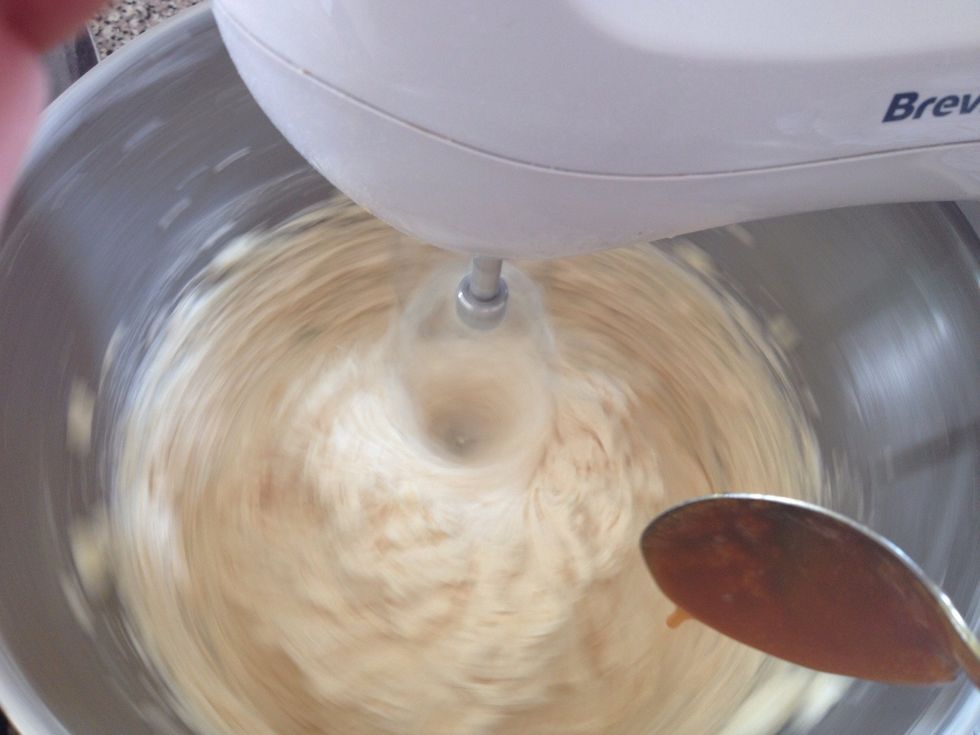 Add the caramel a spoon at a time.