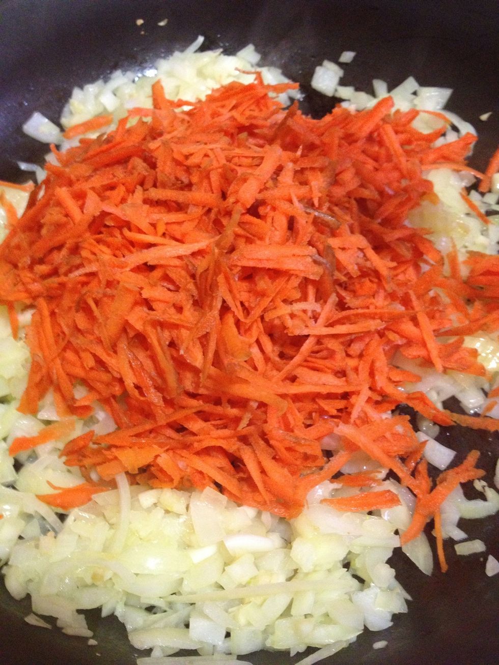 Add the carrots and continue to saut\u00e9