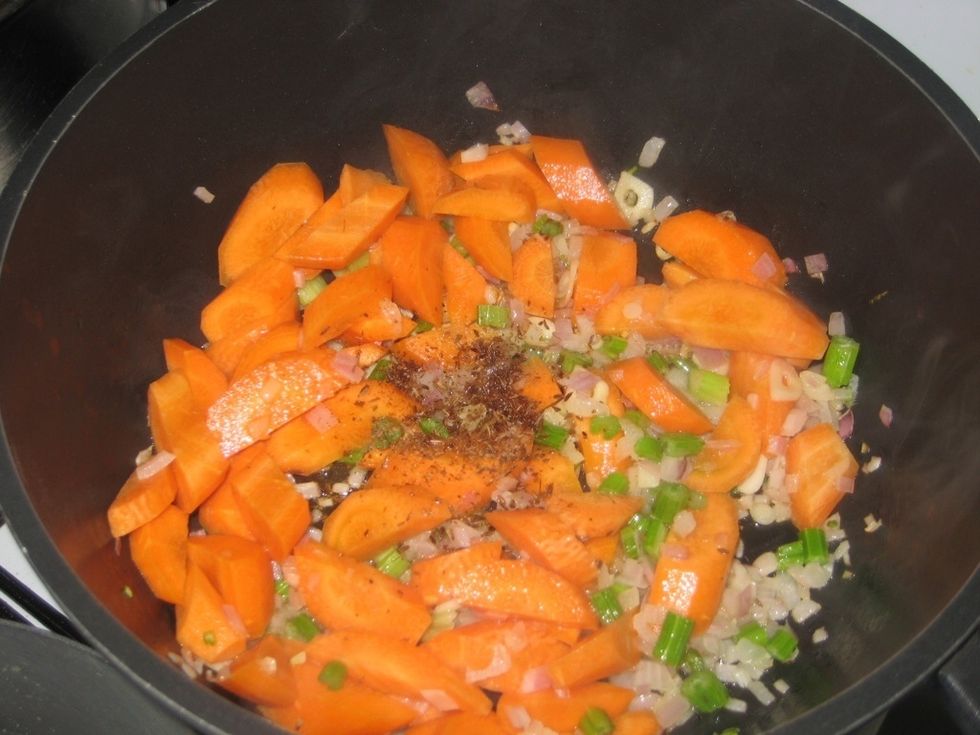 Add the carrots and cumin, give a stir and cook for about 2-3 minutes, stirring constantly.