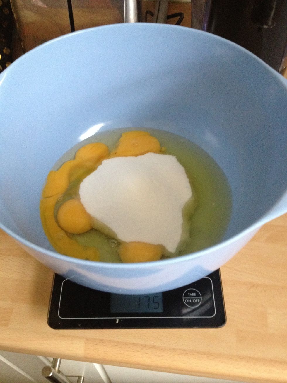 Add the caster sugar to the eggs and whisk until light and frothy.