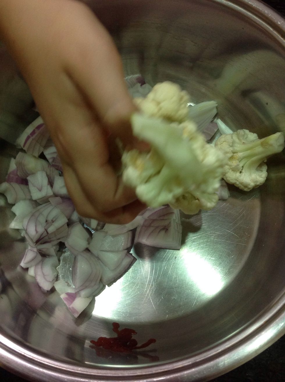 Add the cauliflower florets.