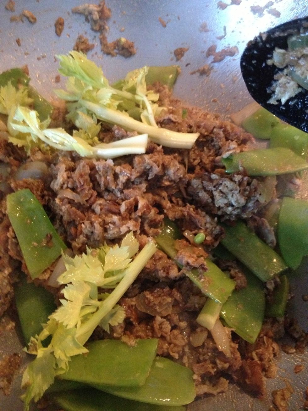 Add the celery tips.