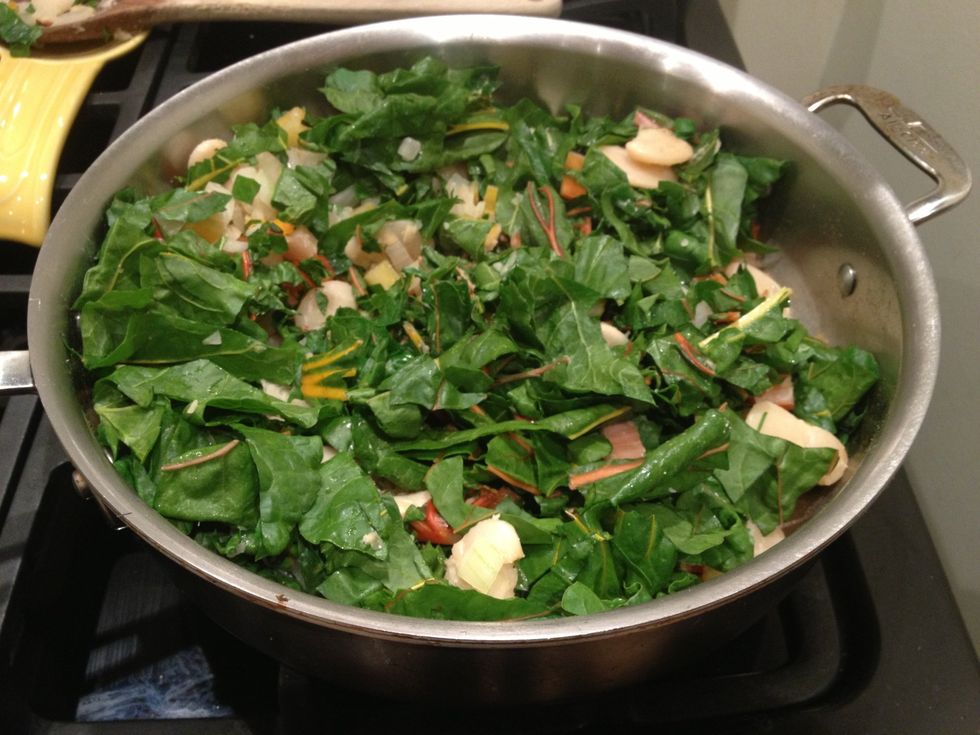 Add the chard leaves, and cook until they wilt. Season with salt and pepper to taste.