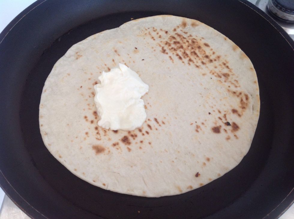 Add the cheese and smear it with a tablespoon