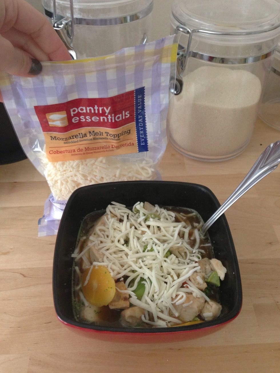 Add the cheese to the top of the mixture.