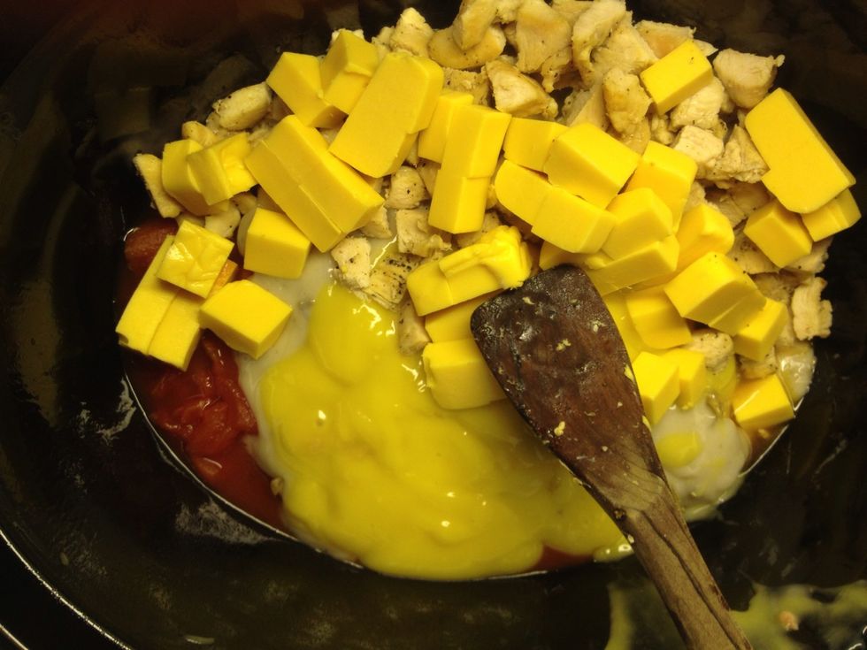 Add the chicken and the cheese to the crockpot
