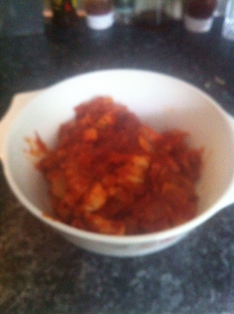 Add the chicken, bacon and onion in the sauce to a oven safe dish