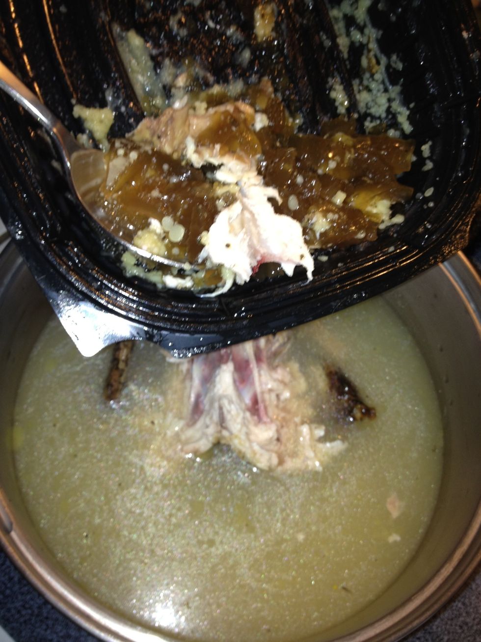 Add the chicken bits and pieces from bottom of container including fat and gel and skin. Bring to a rapid boil to release the flavor from the bone marrow.