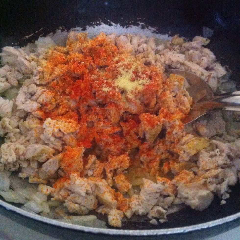 Add the chicken breast, cut into pieces. I boil the breast first then chopped it. Then add the spices. I used: paprika, curry powder n garlic salt or shawarma spices. + salt and pepper for taste.