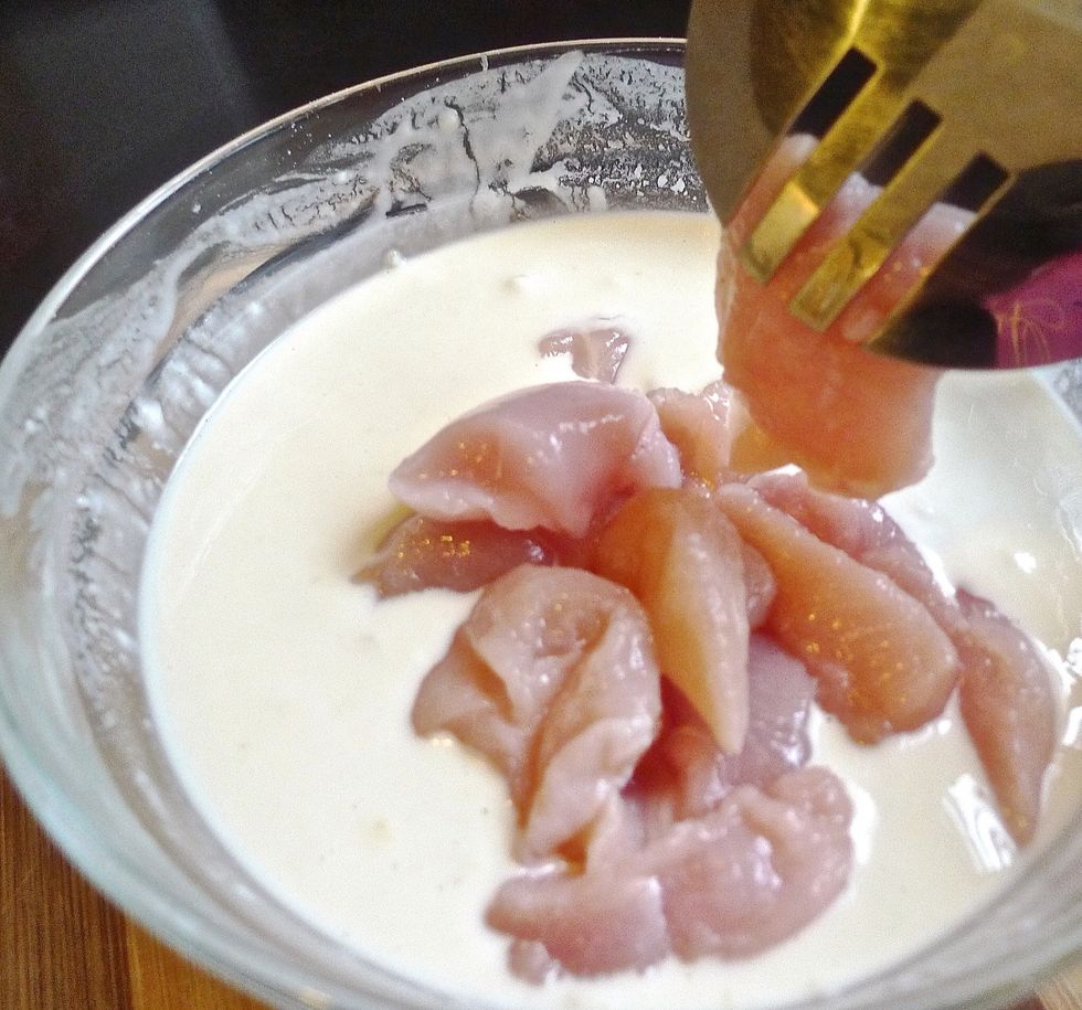 Add the chicken cubes into the batter.