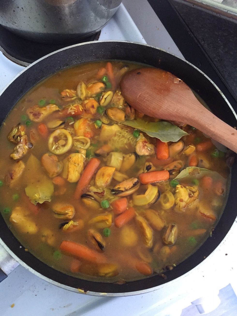 Add the chicken stew cubes already dissolved in hot water and top up with extra water if necessary. You can add the salt here