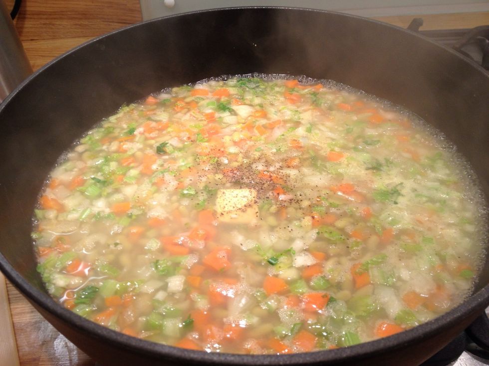 Add the chicken stock and seasoning. I didn't have any fresh stock so used a stock cube. If you're using raw chicken add the thigh (whole) now. Cook for 30-45 mins until everything is soft