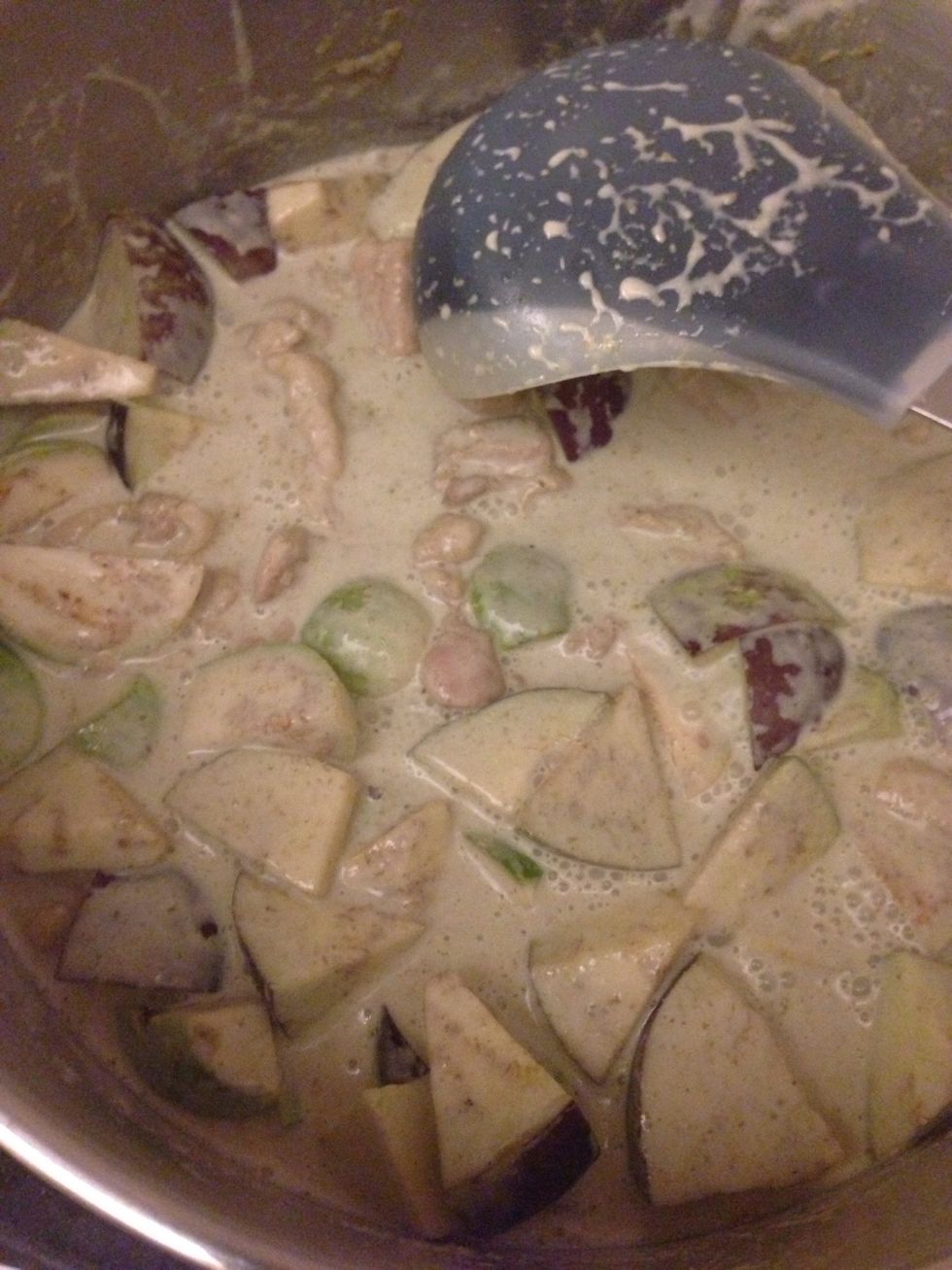 Add the chicken stock. Continue to boil for 10-15 mins. Taste with fish save and brown sugar. It curry should have the lightly sweet taste on the lead"