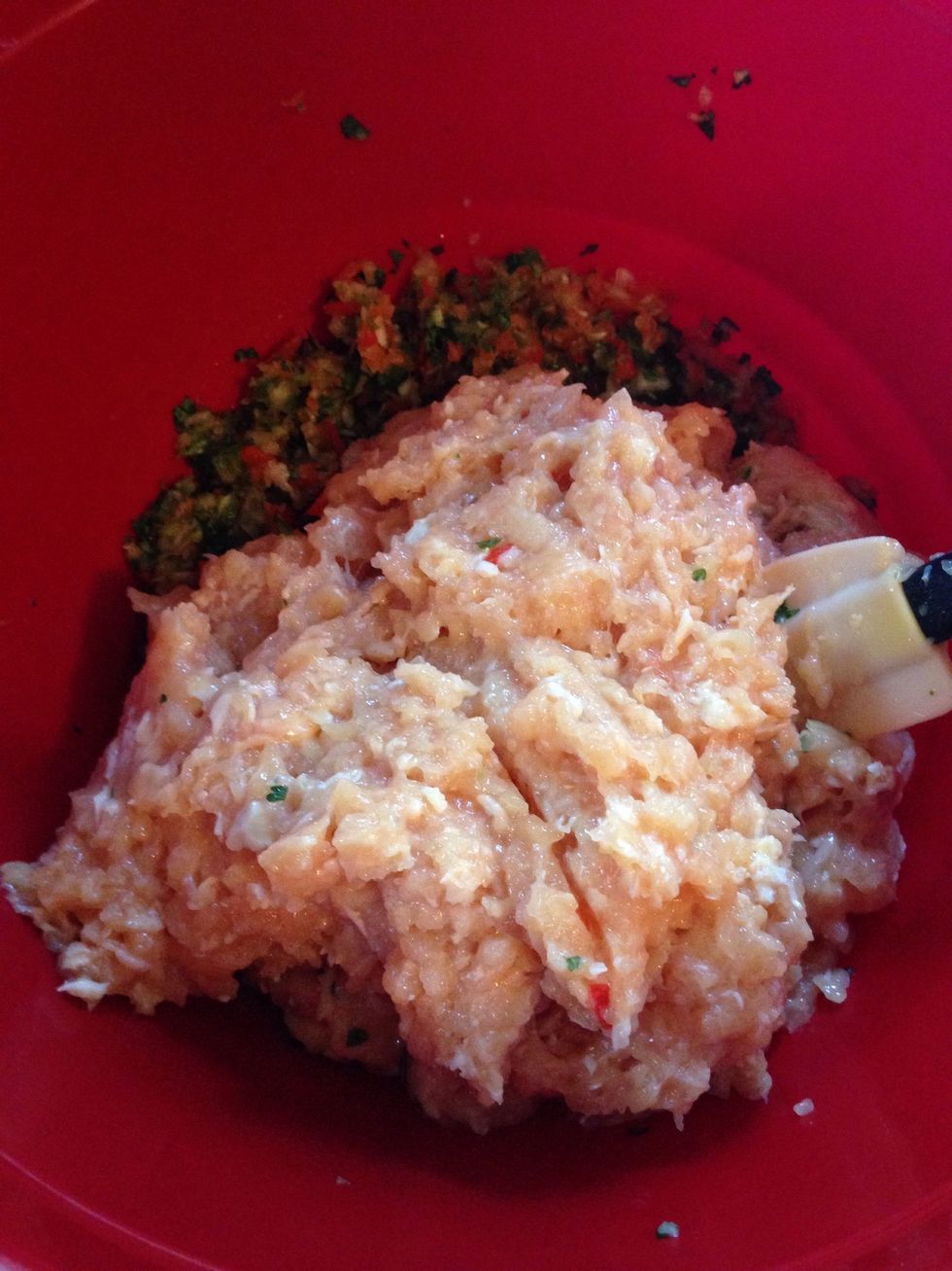 Add the chicken to the bowl where you have your veggies.