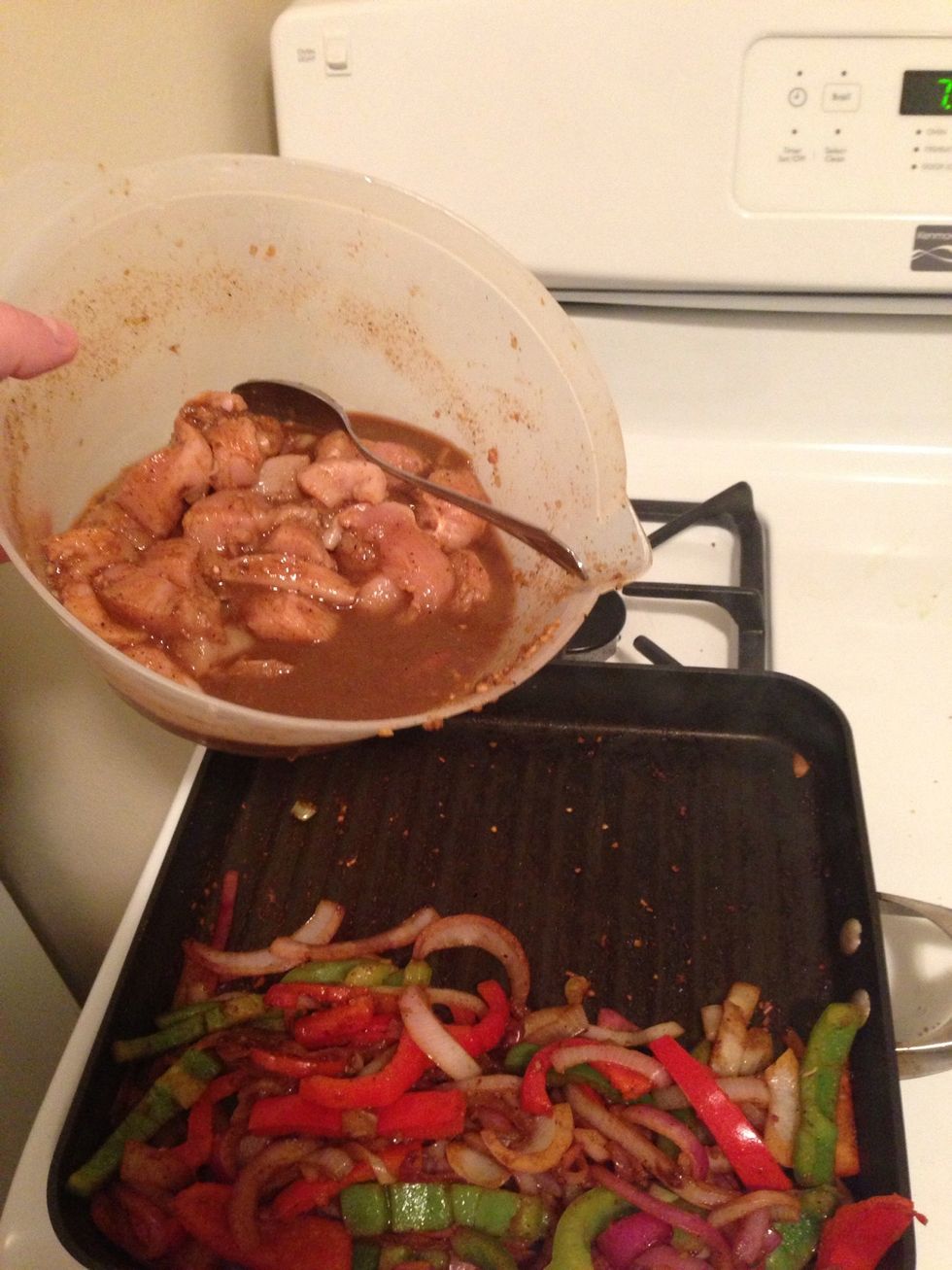 Add the chicken to the pan.