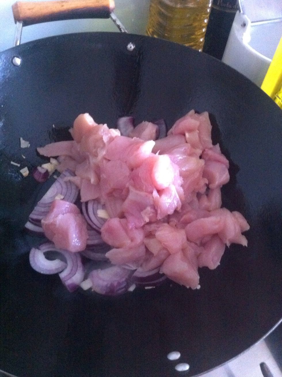 Add the chicken until it is cooked on the outside.