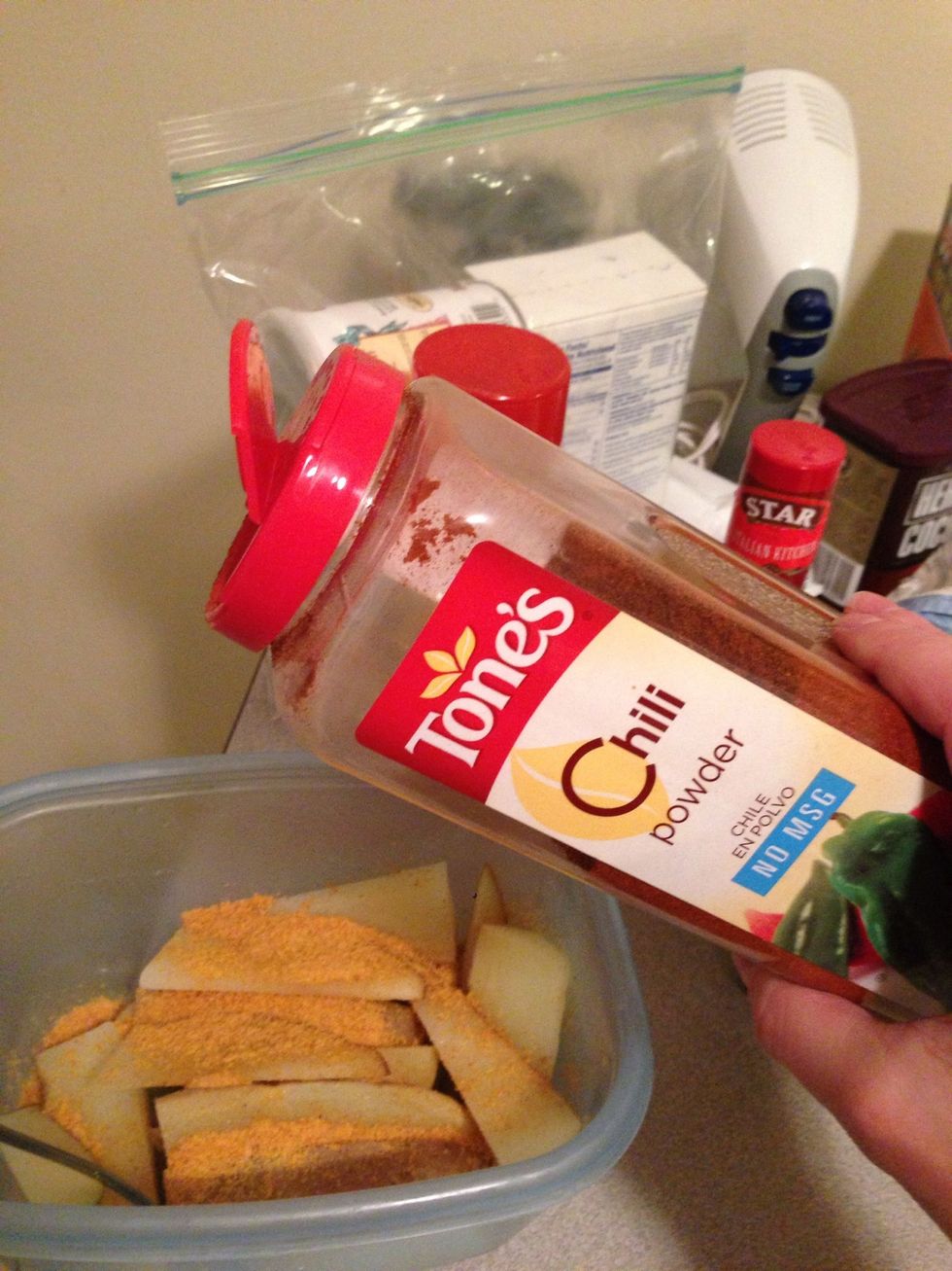 Add the chili powder to flavor.